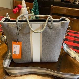 Ryan steal mini tote.  Brand new by Haute shore.